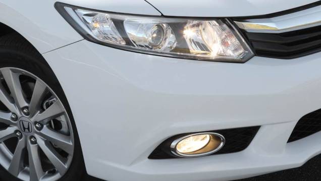 Os preços da linha 2014 variam entre R$ 66.690 (LXS 1.8 manual) e R$ 83.890 (EXR 2.0 automático) | <a href="https://beta-develop.quatrorodas.abril.com.br/noticias/fabricantes/honda-civic-2014-ganha-motor-2-0-730338.shtml" rel="migration">Leia mais</a> Os preços da linha 2014 variam entre R$ 66.690 (LXS 1.8 manual) e R$ 83.890 (EXR 2.0 automático) | <a href="https://beta-develop.quatrorodas.abril.com.br/noticias/fabricantes/honda-civic-2014-ganha-motor-2-0-730338.shtml" rel="migration">Leia mais</a>