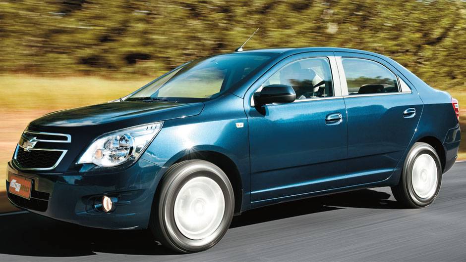 Apesar da cara de Agile, o sedã não deriva do hatch | <a href="https://beta-develop.quatrorodas.abril.com.br/carros/comparativos/chevrolet-cobalt-x-fiat-grand-siena-x-nissan-versa-687466.shtml" target="_blank" rel="migration">Leia mais</a> Apesar da cara de Agile, o sedã não deriva do hatch | <a href="https://beta-develop.quatrorodas.abril.com.br/carros/comparativos/chevrolet-cobalt-x-fiat-grand-siena-x-nissan-versa-687466.shtml" target="_blank" rel="migration">Leia mais</a>