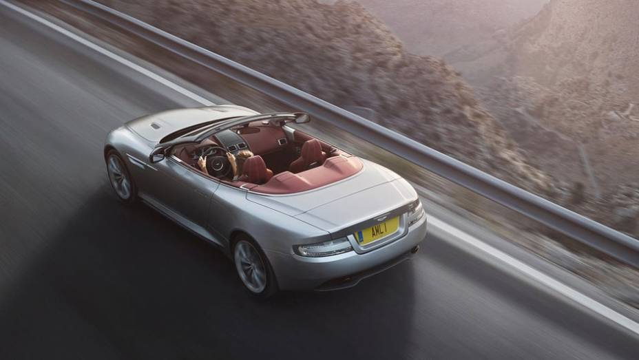 O para-choque traseiro foi redesenhado, estilo que incorpora melhor o spoiler traseiro, conferindo mais aerodin&acirc;mica ao modelo. | <a href="%20https://beta-develop.quatrorodas.abril.com.br/saloes/paris/2012/aston-martin-db9-703323.shtml" rel="migration">Leia mais</a>