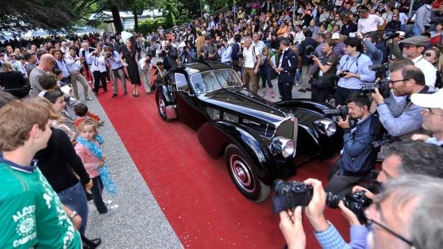 Bugatti 57SC 1938 | <a href="https://beta-develop.quatrorodas.abril.com.br/noticias/fabricantes/bugatti-1938-ralph-lauren-vence-concurso-elegancia-742534.shtml" rel="migration">Leia mais</a> Bugatti 57SC 1938 | <a href="https://beta-develop.quatrorodas.abril.com.br/noticias/fabricantes/bugatti-1938-ralph-lauren-vence-concurso-elegancia-742534.shtml" rel="migration">Leia mais</a>