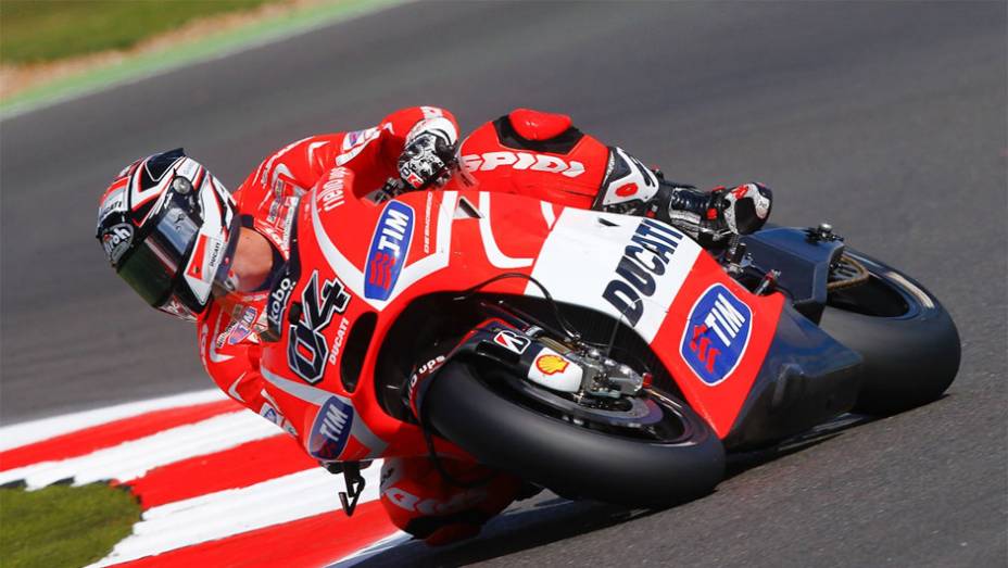 Andrea Dovizioso levou a Ducati ao sétimo lugar nos treinos classificatórios | <a href="https://beta-develop.quatrorodas.abril.com.br/moto/noticias/motogp-marquez-garante-pole-silverstone-751994.shtml" rel="migration">Leia mais</a>