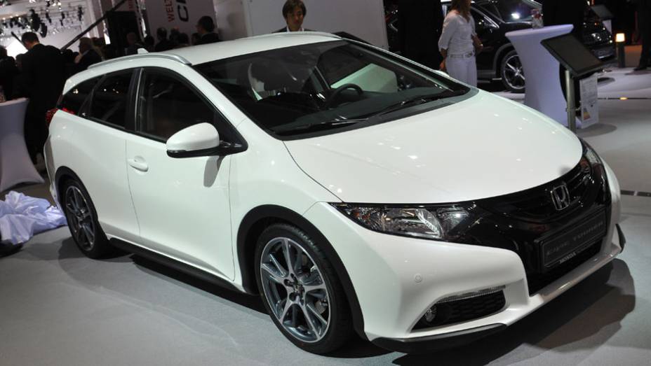 Honda Civic Tourer | <a href="https://beta-develop.quatrorodas.abril.com.br/saloes/frankfurt/2013/honda-civic-tourer-751715.shtml" rel="migration">Leia mais</a> | <a href="https://beta-develop.quatrorodas.abril.com.br/galerias/saloes/frankfurt/2013/direto-frankfurt-2013-1-753497.shtml" rel="migration">Direto de Fr</a>