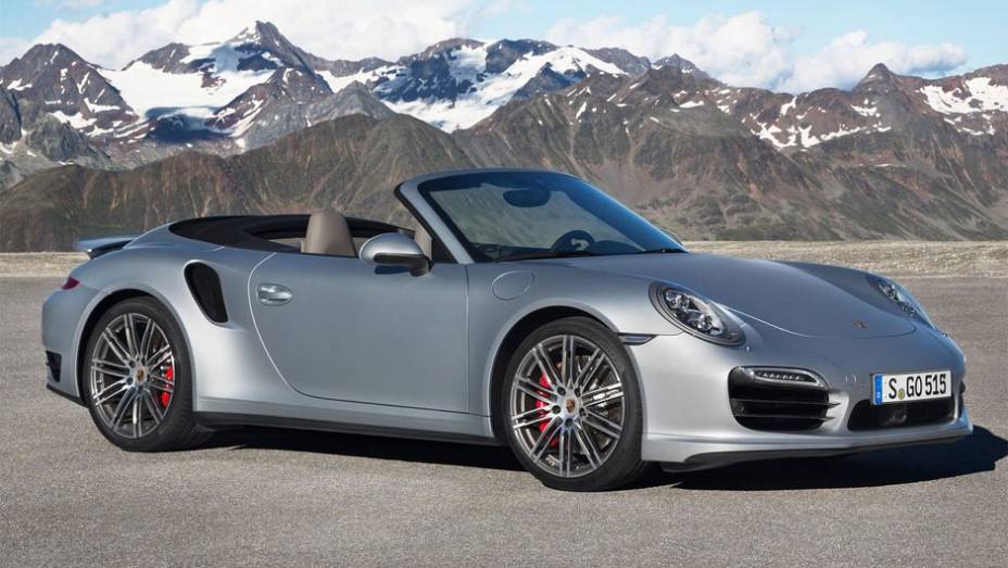 Porsche revela 911 Turbo Cabriolet 2014 | <a href="https://beta-develop.quatrorodas.abril.com.br/noticias/fabricantes/porsche-revela-911-turbo-turbo-s-cabriolet-754889.shtml" rel="migration">Leia mais</a>