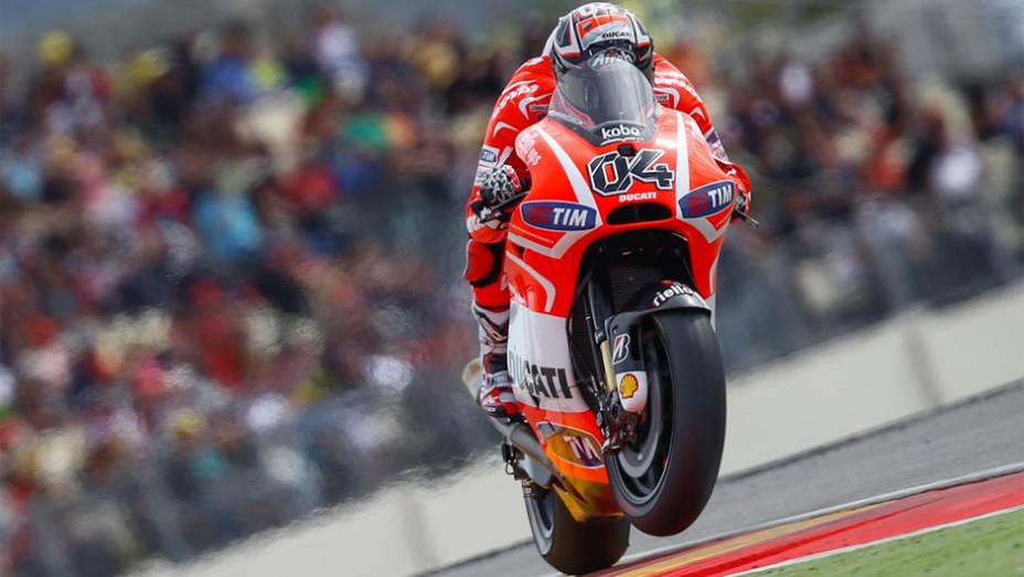 Andrea Dovizioso largará em nono no domingo | <a href="https://beta-develop.quatrorodas.abril.com.br/moto/noticias/motogp-marquez-garante-pole-aragon-755537.shtml" rel="migration">Leia mais</a>