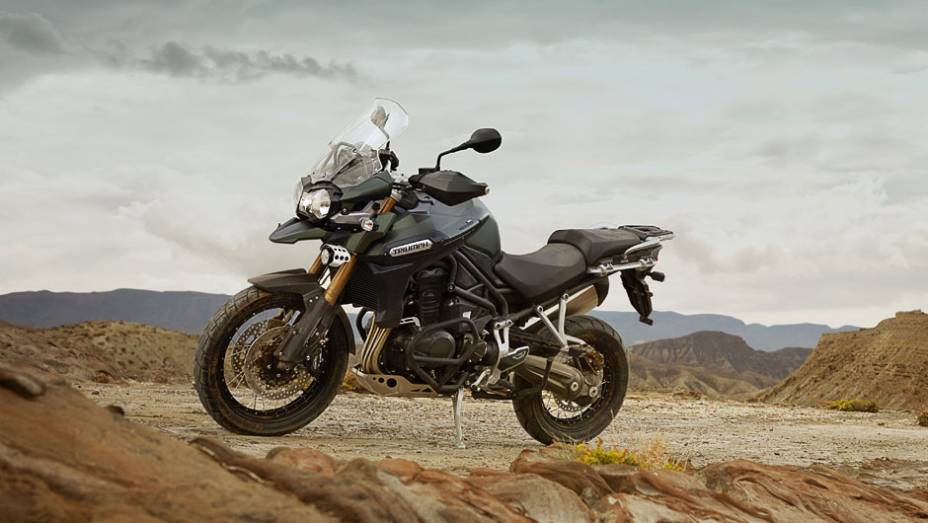 Triumph lançou a nova Tiger Explorer XC no Salão Duas Rodas 2013 | <a href="https://beta-develop.quatrorodas.abril.com.br/moto/noticias/triumph-revela-lancamentos-salao-duas-rodas-756393.shtml" rel="migration">Leia mais</a>