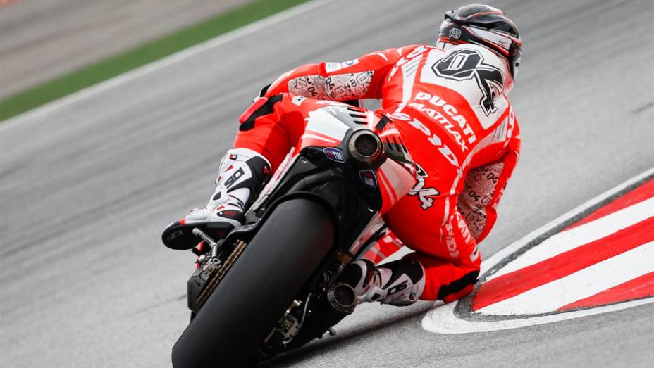 Andrea Dovizioso terminou o GP da Malásia em oitavo | <a href="https://beta-develop.quatrorodas.abril.com.br/moto/noticias/motogp-dani-pedrosa-vence-sepang-756916.shtml" rel="migration">Leia mais</a>