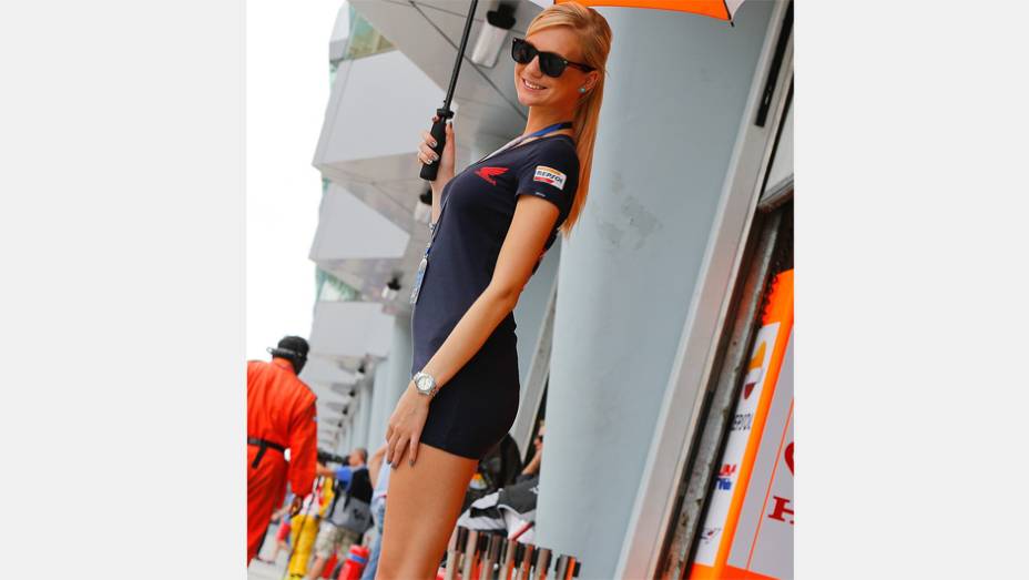 Veja as belas garotas da MotoGP da Malásia e saiba como foi a corrida | <a href="https://beta-develop.quatrorodas.abril.com.br/moto/noticias/motogp-dani-pedrosa-vence-sepang-756916.shtml" rel="migration">Leia mais</a>