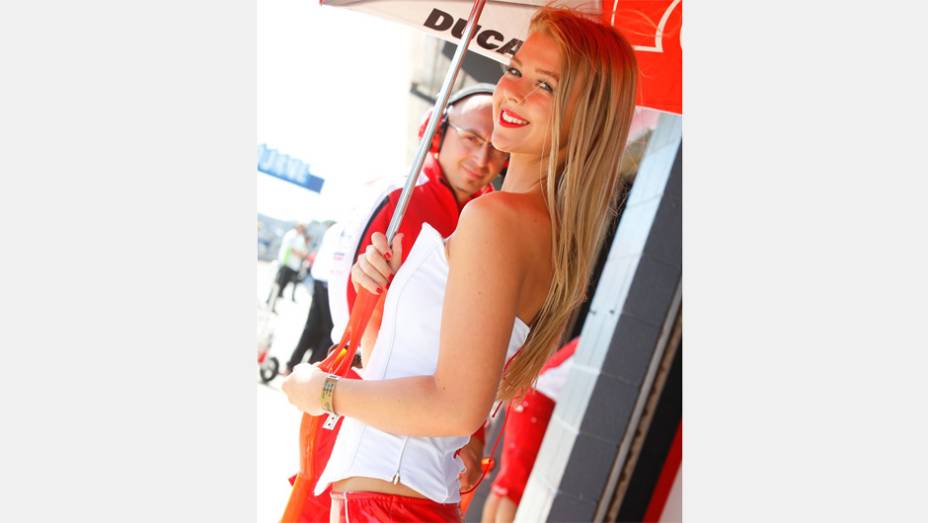 Veja as belas Garotas da MotoGP - Austrália | <a href="https://beta-develop.quatrorodas.abril.com.br/moto/noticias/motogp-lorenzo-vence-embola-campeonato-757595.shtml" rel="migration">Leia mais</a>