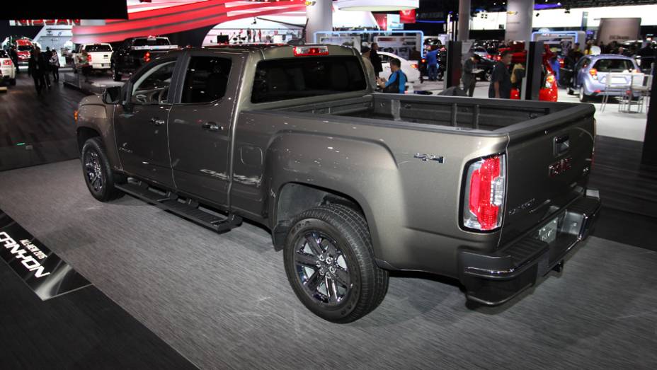 GMC Canyon | <a href="https://beta-develop.quatrorodas.abril.com.br/noticias/saloes/detroit-2014/gmc-mostra-nova-canyon-detroit-769475.shtml" rel="migration">Leia mais</a>