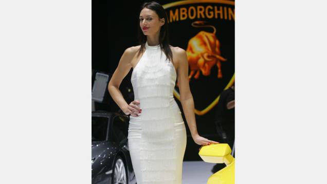 Veja as belas Garotas do <a href="https://beta-develop.quatrorodas.abril.com.br/noticias/saloes/genebra-2014/" rel="migration">Salão de Genebra 2014</a> Veja as belas Garotas do <a href="https://beta-develop.quatrorodas.abril.com.br/noticias/saloes/genebra-2014/" rel="migration">Salão de Genebra 2014</a>