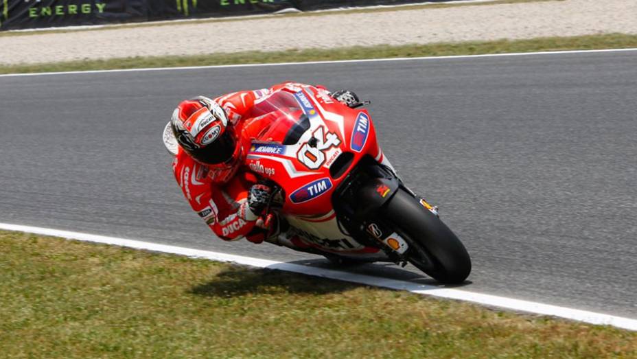 Andrea Dovizioso | <a href="https://beta-develop.quatrorodas.abril.com.br/moto/noticias/motogp-pedrosa-largara-frente-barcelona-786152.shtml" rel="migration">Leia mais</a>