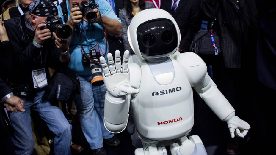 Honda ASIMO | <a href="https://beta-develop.quatrorodas.abril.com.br/blogs/planeta-carro/2014/04/17/honda-revela-nova-versao-do-asimo/" rel="migration">Leia mais</a> Honda ASIMO | <a href="https://beta-develop.quatrorodas.abril.com.br/blogs/planeta-carro/2014/04/17/honda-revela-nova-versao-do-asimo/" rel="migration">Leia mais</a>