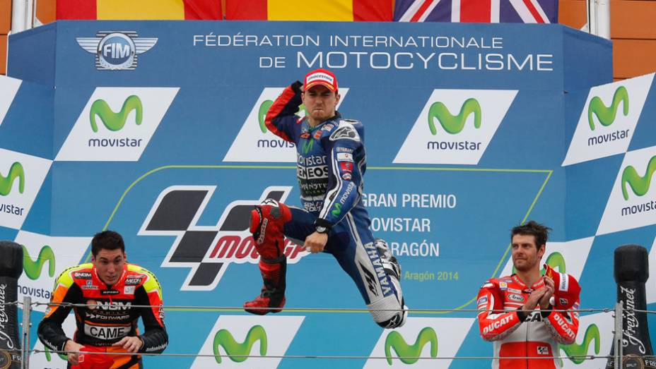 Pódio do GP de Aragón | <a href="https://beta-develop.quatrorodas.abril.com.br/moto/noticias/lorenzo-vence-prova-numero-800-motogp-802800.shtml" rel="migration">Leia mais</a>