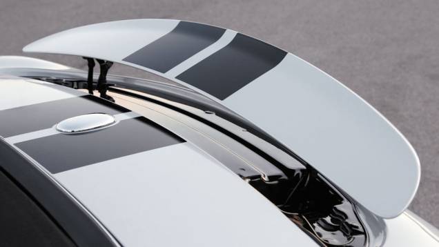 O aerofólio traseiro se levanta automaticamente a partir dos 80 km/h. | <a href="https://beta-develop.quatrorodas.abril.com.br/carros/impressoes/mini-cooper-roadster-679682.shtml" rel="migration">Leia mais</a> O aerofólio traseiro se levanta automaticamente a partir dos 80 km/h. | <a href="https://beta-develop.quatrorodas.abril.com.br/carros/impressoes/mini-cooper-roadster-679682.shtml" rel="migration">Leia mais</a>