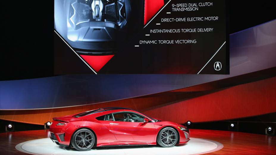 Acura NSX | <a href="https://beta-develop.quatrorodas.abril.com.br/noticias/saloes/detroit-2015/acura-oficializa-nsx-modelo-pode-vir-ao-brasil-824741.shtml" rel="migration">Leia mais</a> | <a href="https://beta-develop.quatrorodas.abril.com.br/galerias/saloes/detroit-2015/direto-detroit-parte-2-825561" rel="migration"></a>