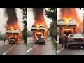 Fearless truck driver reverses new car off his blazing lorry