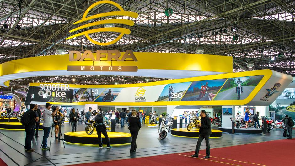 Estande da Dafra no Salão Duas Rodas 2013 | <a href="https://beta-develop.quatrorodas.abril.com.br/moto/noticias/dafra-apresenta-novos-modelos-salao-duas-rodas-756438.shtml" rel="migration">Leia mais</a> Estande da Dafra no Salão Duas Rodas 2013 | <a href="https://beta-develop.quatrorodas.abril.com.br/moto/noticias/dafra-apresenta-novos-modelos-salao-duas-rodas-756438.shtml" rel="migration">Leia mais</a>