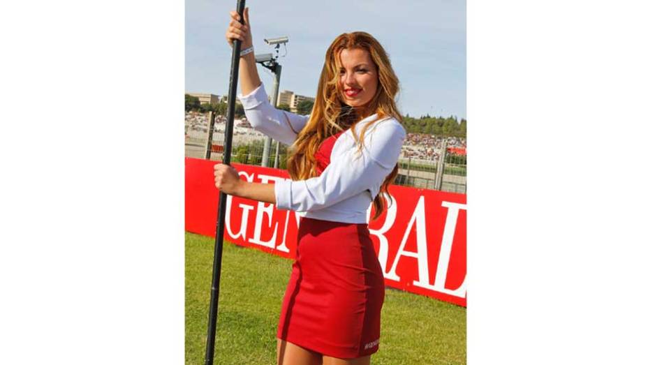Veja as belas Garotas da MotoGP - Valencia | <a href="https://beta-develop.quatrorodas.abril.com.br/moto/noticias/lorenzo-vence-nao-impede-titulo-marquez-759873.shtml" rel="migration">Leia mais</a>
