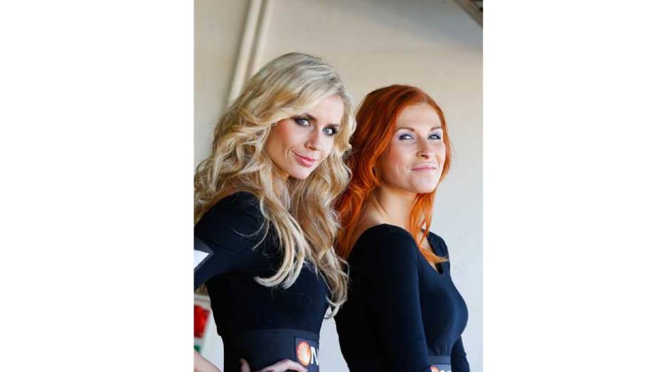 Veja as belas Garotas da MotoGP - Valencia | <a href="https://beta-develop.quatrorodas.abril.com.br/moto/noticias/lorenzo-vence-nao-impede-titulo-marquez-759873.shtml" rel="migration">Leia mais</a>