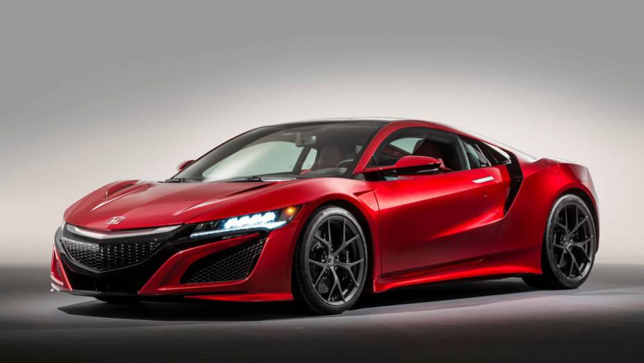 É ele mesmo: dois meses após estrear em Detroit, o novo NSX ressurge em Genebra - agora como Honda, e não Acura | <a href="https://beta-develop.quatrorodas.abril.com.br/noticias/saloes/genebra-2015/honda-revela-nsx-europeu-842884.shtml" target="_blank" rel="migration">Leia mais</a>