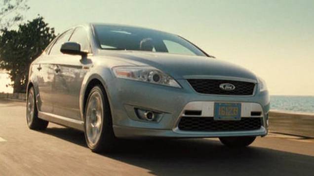 2006: Daniel Craig assume o personagem e desfruta de diversos automóveis em 007 - Cassino Royale". Um deles é o Ford Mondeo. | <a href="%20https://beta-develop.quatrorodas.abril.com.br/blogs/planeta-carro/2012/11/07/licenca-para-acelerar/" rel="migration">Leia mais</a> 2006: Daniel Craig assume o personagem e desfruta de diversos automóveis em 007 - Cassino Royale". Um deles é o Ford Mondeo. | <a href="%20https://beta-develop.quatrorodas.abril.com.br/blogs/planeta-carro/2012/11/07/licenca-para-acelerar/" rel="migration">Leia mais</a>