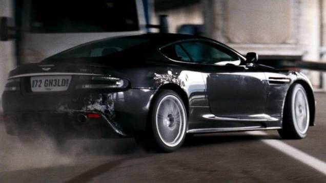 2008: O contestado "008 - Quantum of Solace" traz James Bond, para variar, a bordo de um Aston Martin, o DBS. | <a href="%20https://beta-develop.quatrorodas.abril.com.br/blogs/planeta-carro/2012/11/07/licenca-para-acelerar/" rel="migration">Leia mais</a>