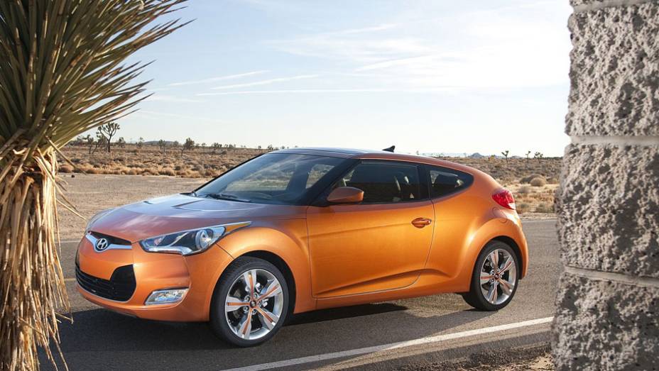 Hatch conta com motor 1.6 de 138 cavalos de potência | <a href="https://beta-develop.quatrorodas.abril.com.br/carros/lancamentos/hyundai-veloster-641581.shtml" rel="migration">Leia mais</a>