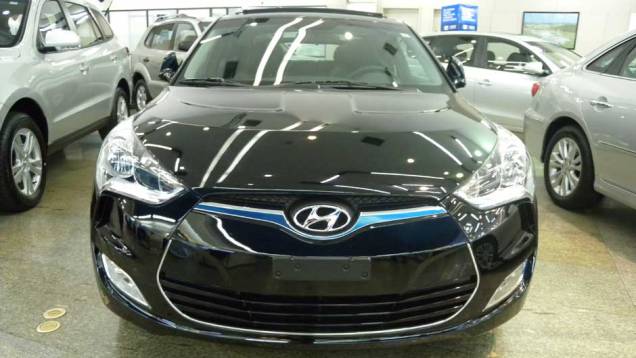 Hyundai Veloster | <a href="https://beta-develop.quatrorodas.abril.com.br/noticias/veloster-elantra-ja-estao-venda-concessionarias-hyundai-303518_p.shtml" rel="migration">Leia mais</a>