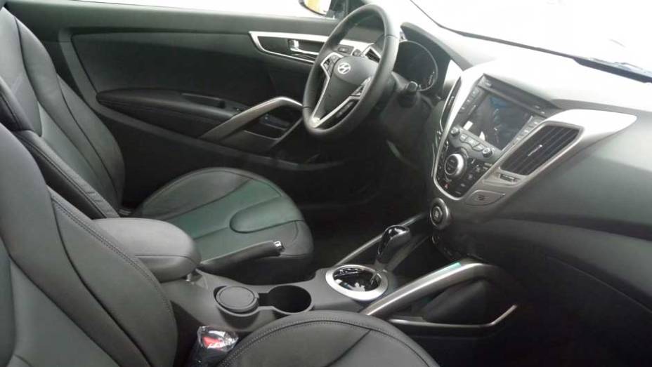 Hyundai Veloster | <a href="https://beta-develop.quatrorodas.abril.com.br/noticias/veloster-elantra-ja-estao-venda-concessionarias-hyundai-303518_p.shtml" rel="migration">Leia mais</a>
