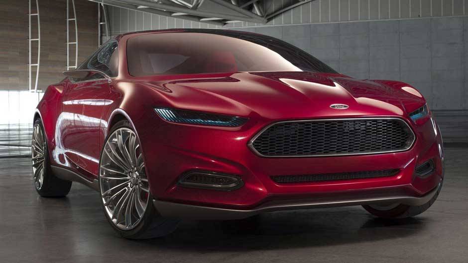 Grade frontal &eacute; muito parecida com os carros da Aston Martin | <a href="https://beta-develop.quatrorodas.abril.com.br/noticias/ford-mostra-cupe-esportivo-evos-300581_p.shtml" rel="migration">Leia mais</a>