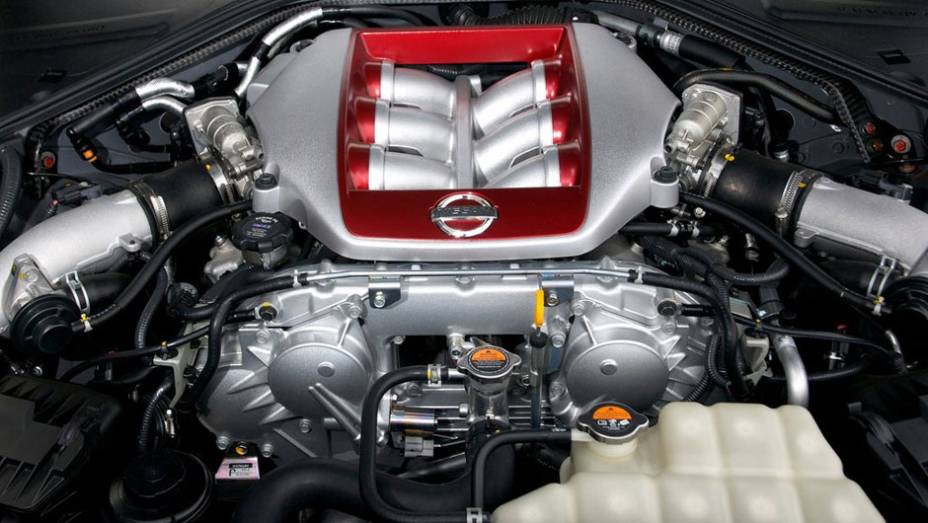 <a href="https://beta-develop.quatrorodas.abril.com.br/noticias/nissan-faz-melhorias-gt-r-306767_p.shtml" rel="migration">Leia mais</a> <a href="https://beta-develop.quatrorodas.abril.com.br/noticias/nissan-faz-melhorias-gt-r-306767_p.shtml" rel="migration">Leia mais</a>