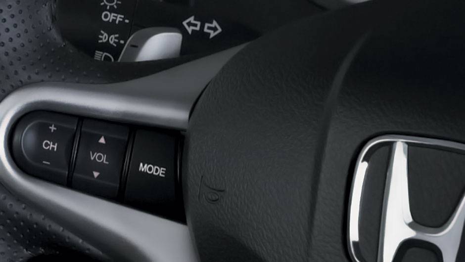 Vers&atilde;o EX autom&aacute;tica ganhou borboletas para troca de marchas atr&aacute;s do volante | <a href="https://beta-develop.quatrorodas.abril.com.br/carros/lancamentos/honda-fit-2013-680204.shtml" rel="migration">Leia mais</a>