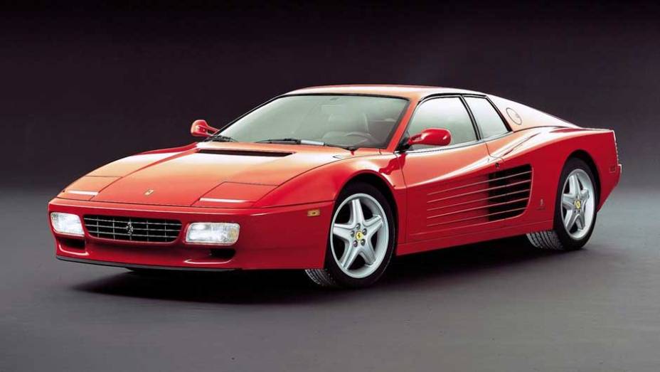 Ferrari 512 TR: sucessora da clássica Testarossa, conquistou fãs pelo estilo arrebatador e o motor V12 de quase 500 cv | <a href="https://beta-develop.quatrorodas.abril.com.br/noticias/sergio-pininfarina-morre-aos-85-anos-324190_p.shtml" target="_blank" rel="migration">Leia mais</a>