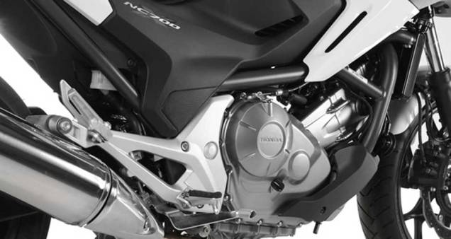 Motor é bicilíndrico em linha de 669,6 cc | <a href="https://beta-develop.quatrorodas.abril.com.br/moto/noticias/honda-nc-700x-made-in-manaus-691787.shtml" rel="migration">Leia mais</a> Motor é bicilíndrico em linha de 669,6 cc | <a href="https://beta-develop.quatrorodas.abril.com.br/moto/noticias/honda-nc-700x-made-in-manaus-691787.shtml" rel="migration">Leia mais</a>
