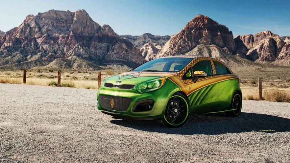 Este &eacute; o exemplar do Aquaman! O modelo que foi customizado foi o Rio 5 portas. | <a href="https://beta-develop.quatrorodas.abril.com.br/noticias/entretenimento/kia-mostra-cinco-carros-super-herois-713665.shtml" rel="migration">Leia mais</a>
