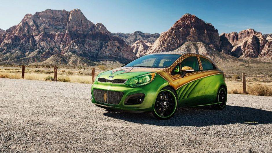 Este &eacute; o exemplar do Aquaman! O modelo que foi customizado foi o Rio 5 portas. | <a href="https://beta-develop.quatrorodas.abril.com.br/noticias/entretenimento/kia-mostra-cinco-carros-super-herois-713665.shtml" rel="migration">Leia mais</a>