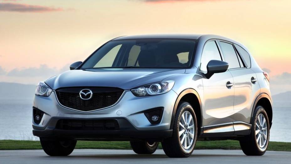 CARRO DO ANO - Mazda CX5 | <a href="https://beta-develop.quatrorodas.abril.com.br/noticias/mercado/finalistas-premio-carro-mundial-2013-sao-revelados-732525.shtml" rel="migration">Leia mais</a>