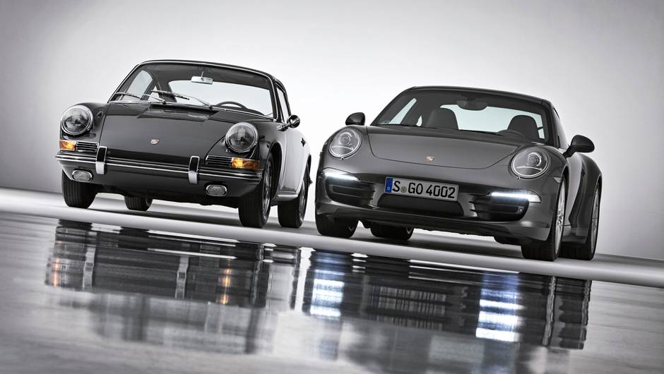 O primeiro 911 tinha um motor boxer de seis cilindros com 130 cv; aqui, ele aparece ao lado da última geração do carro, conhecida internamente como 991 | <a href="https://beta-develop.quatrorodas.abril.com.br/noticias/fabricantes/porsche-celebra-50-anos-911-733368.shtm" rel="migration"></a> O primeiro 911 tinha um motor boxer de seis cilindros com 130 cv; aqui, ele aparece ao lado da última geração do carro, conhecida internamente como 991 | <a href="https://beta-develop.quatrorodas.abril.com.br/noticias/fabricantes/porsche-celebra-50-anos-911-733368.shtm" rel="migration"></a>