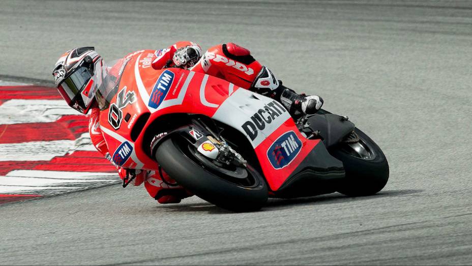 Andrea Dovizioso (Ducati Team) ficou em oitavo no &uacute;ltimo dia de testes em Sepang. <a href="https://beta-develop.quatrorodas.abril.com.br/moto/noticias/motogp-pedrosa-lidera-ultimo-dia-sepang-734820.shtml" rel="migration">Leia mais</a>