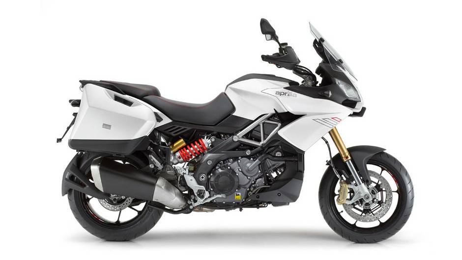 Aprilia Caponord 1200 2013 est&aacute; dispon&iacute;vel nas cores vermelha, cinza e branca | <a href="https://beta-develop.quatrorodas.abril.com.br/moto/noticias/conheca-aprilia-caponord-1200-2013-736522.shtml" rel="migration">Leia mais</a>