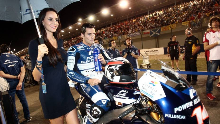 Veja como foi a corrida que contou com a presen&ccedil;a de belas garotas! | <a href="https://beta-develop.quatrorodas.abril.com.br/moto/galerias/competicoes/motogp-catar-corrida-738027.shtml" rel="migration">Leia mais</a>
