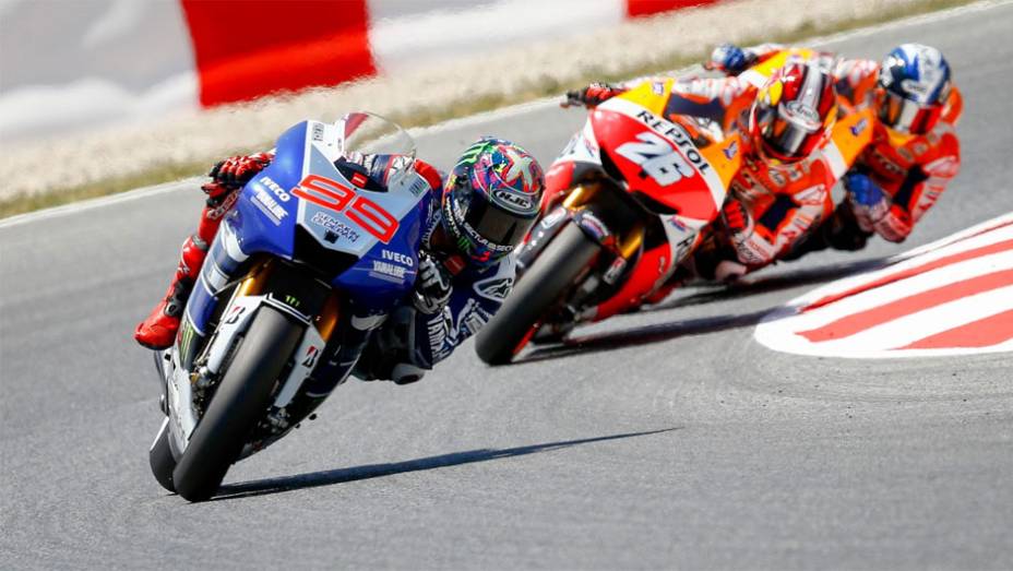 Lorenzo fez uma largada espetacular | <a href="https://beta-develop.quatrorodas.abril.com.br/moto/noticias/motogp-lorenzo-domina-gp-catalunha-744220.shtml" rel="migration">Leia mais</a>