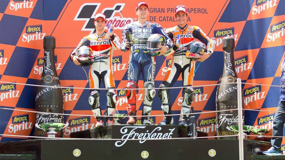 Espanh&oacute;is dominam o p&oacute;dio, mais uma vez | <a href="https://beta-develop.quatrorodas.abril.com.br/moto/noticias/motogp-lorenzo-domina-gp-catalunha-744220.shtml" rel="migration">Leia mais</a>