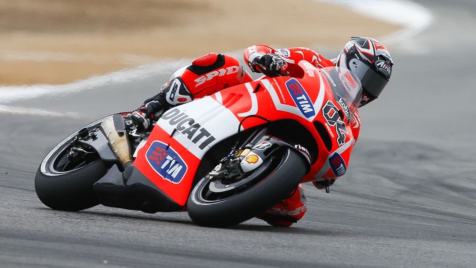 Andrea Dovizioso (Ducati Team) foi o terceiro | <a href="https://beta-develop.quatrorodas.abril.com.br/moto/noticias/motogp-marquez-lidera-laguna-seca-747560.shtml" rel="migration">Leia mais</a>