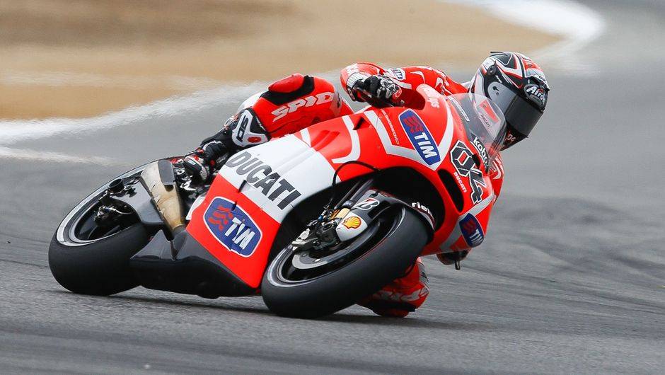 Andrea Dovizioso (Ducati Team) foi o terceiro | <a href="https://beta-develop.quatrorodas.abril.com.br/moto/noticias/motogp-marquez-lidera-laguna-seca-747560.shtml" rel="migration">Leia mais</a>