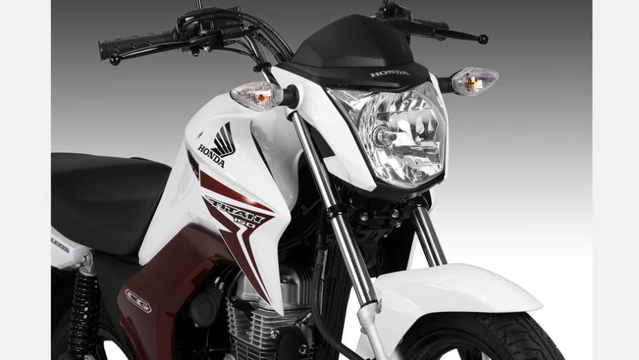 Honda CG 2014 conta com novo conjunto óptico| <a href="https://beta-develop.quatrorodas.abril.com.br/moto/noticias/honda-lanca-cg-2014-totalmente-renovada-748587.shtml" rel="migration">Leia mais</a>