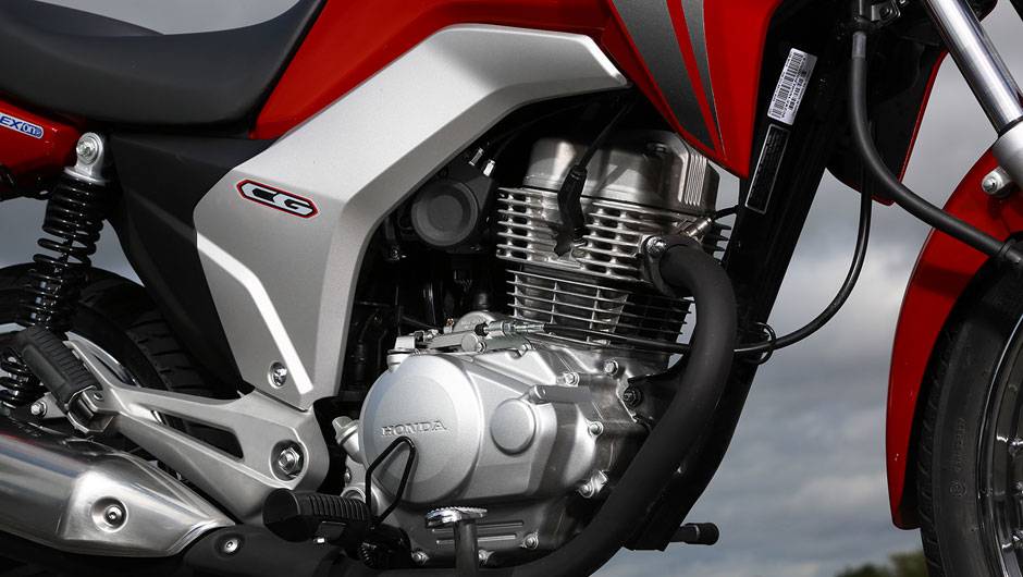 A linha CG 150 apresenta o motor OHC de 149,2 cm³ e quatro tempos com sistema Flex | <a href="https://beta-develop.quatrorodas.abril.com.br/moto/noticias/honda-lanca-cg-2014-totalmente-renovada-748587.shtml" rel="migration">Leia mais</a> A linha CG 150 apresenta o motor OHC de 149,2 cm³ e quatro tempos com sistema Flex | <a href="https://beta-develop.quatrorodas.abril.com.br/moto/noticias/honda-lanca-cg-2014-totalmente-renovada-748587.shtml" rel="migration">Leia mais</a>