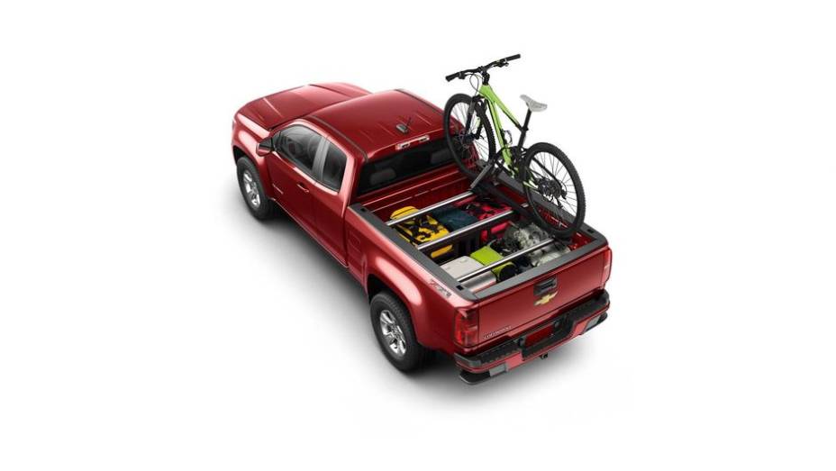 A promessa é de que a nova Colorado seja líder em termos de capacidade de carga, além de poder puxar um trailer de até 3.039 kg | <a href="https://beta-develop.quatrorodas.abril.com.br/noticias/saloes/los-angeles-2013/chevrolet-apresenta-nova-colorado-760712.shtml" rel="migration">Lei</a>
