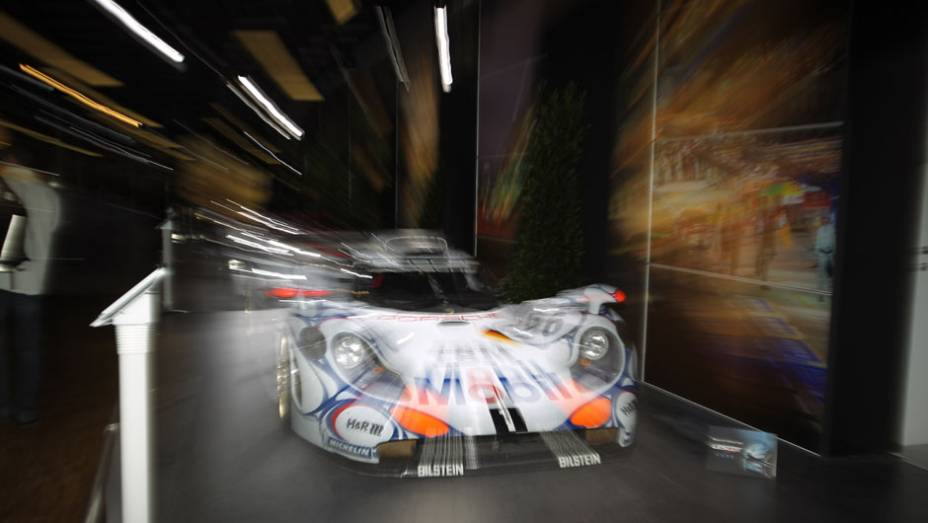 Porsche GTI (1998) | <a href="https://beta-develop.quatrorodas.abril.com.br/noticias/saloes/genebra-2014/salao-genebra-exibe-bolidos-le-mans-775992.shtml" rel="migration">Leia mais</a> | <a href="https://beta-develop.quatrorodas.abril.com.br/noticias/saloes/genebra-2014/" rel="migration">Confira tudo sobre o Salão</a> Porsche GTI (1998) | <a href="https://beta-develop.quatrorodas.abril.com.br/noticias/saloes/genebra-2014/salao-genebra-exibe-bolidos-le-mans-775992.shtml" rel="migration">Leia mais</a> | <a href="https://beta-develop.quatrorodas.abril.com.br/noticias/saloes/genebra-2014/" rel="migration">Confira tudo sobre o Salão</a>