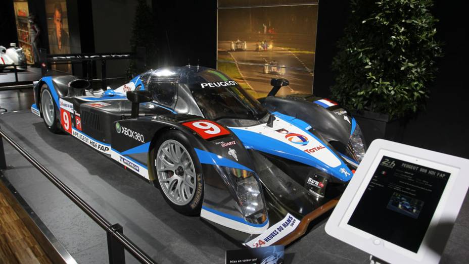 Peugeot 908 HDi (2009) | <a href="https://beta-develop.quatrorodas.abril.com.br/noticias/saloes/genebra-2014/salao-genebra-exibe-bolidos-le-mans-775992.shtml" rel="migration">Leia mais</a> | <a href="https://beta-develop.quatrorodas.abril.com.br/noticias/saloes/genebra-2014/" rel="migration">Confira tudo sobre o S</a> Peugeot 908 HDi (2009) | <a href="https://beta-develop.quatrorodas.abril.com.br/noticias/saloes/genebra-2014/salao-genebra-exibe-bolidos-le-mans-775992.shtml" rel="migration">Leia mais</a> | <a href="https://beta-develop.quatrorodas.abril.com.br/noticias/saloes/genebra-2014/" rel="migration">Confira tudo sobre o S</a>